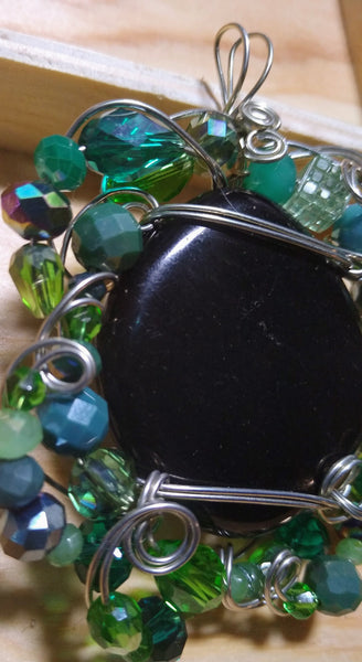 Jet in the Garden Pendant