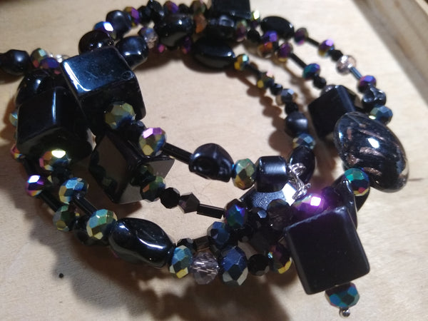 Midnight Rainbow Black and Aurora Crystal Gothic Bracelet With Black Skulls
