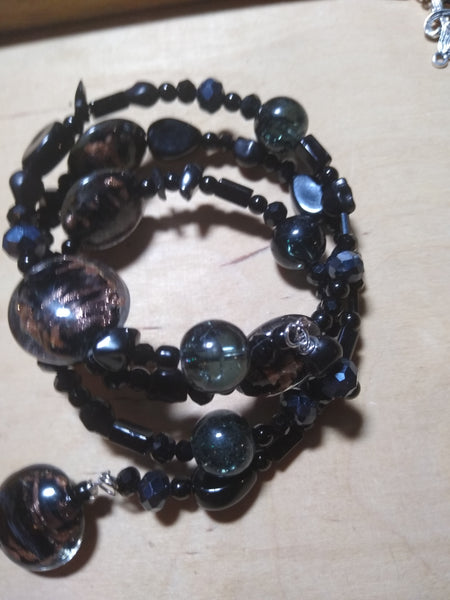 Pitch Black:  Black and Copper Lampwork, Black and Hematite Aurora Crystal Gothic Bracelet With Black Skulls