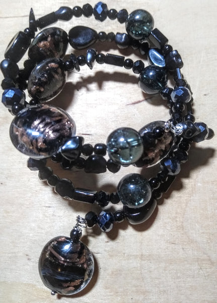 Pitch Black:  Black and Copper Lampwork, Black and Hematite Aurora Crystal Gothic Bracelet With Black Skulls