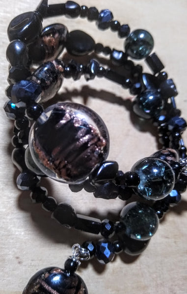 Pitch Black:  Black and Copper Lampwork, Black and Hematite Aurora Crystal Gothic Bracelet With Black Skulls