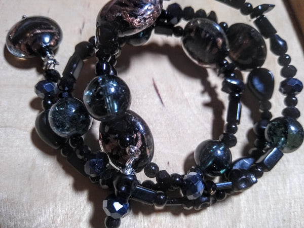 Pitch Black:  Black and Copper Lampwork, Black and Hematite Aurora Crystal Gothic Bracelet With Black Skulls