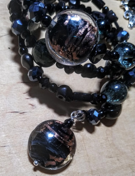 Pitch Black:  Black and Copper Lampwork, Black and Hematite Aurora Crystal Gothic Bracelet With Black Skulls