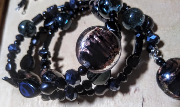 Pitch Black:  Black and Copper Lampwork, Black and Hematite Aurora Crystal Gothic Bracelet With Black Skulls