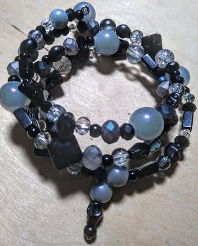 Black, Silver, and Oilslick Gray Crystal Bracelet with Black Skulls