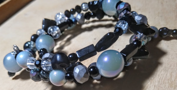 Black, Silver, and Oilslick Gray Crystal Bracelet with Black Skulls